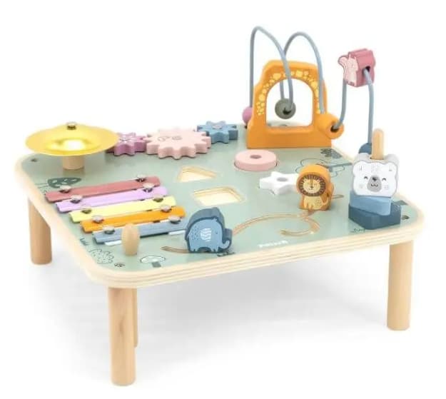 tavolo multiattività montessori: tavolo bianco con giochi sopra